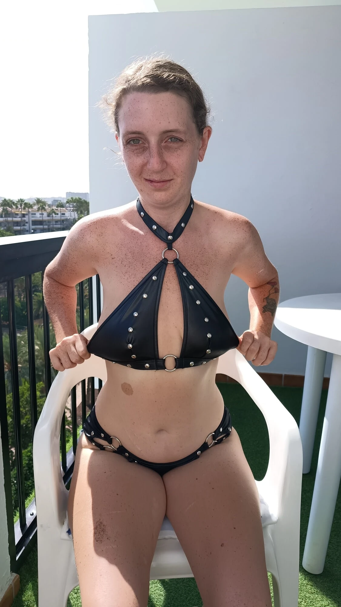 Sexy Submissive Out On Her Balcony In Leather  #2