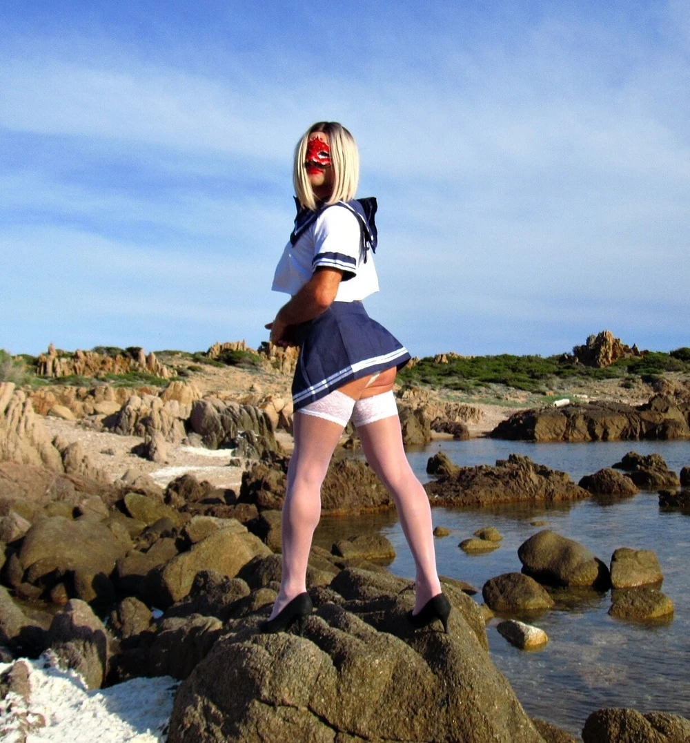 Kinky Blonde milf sailor shows ass. #2