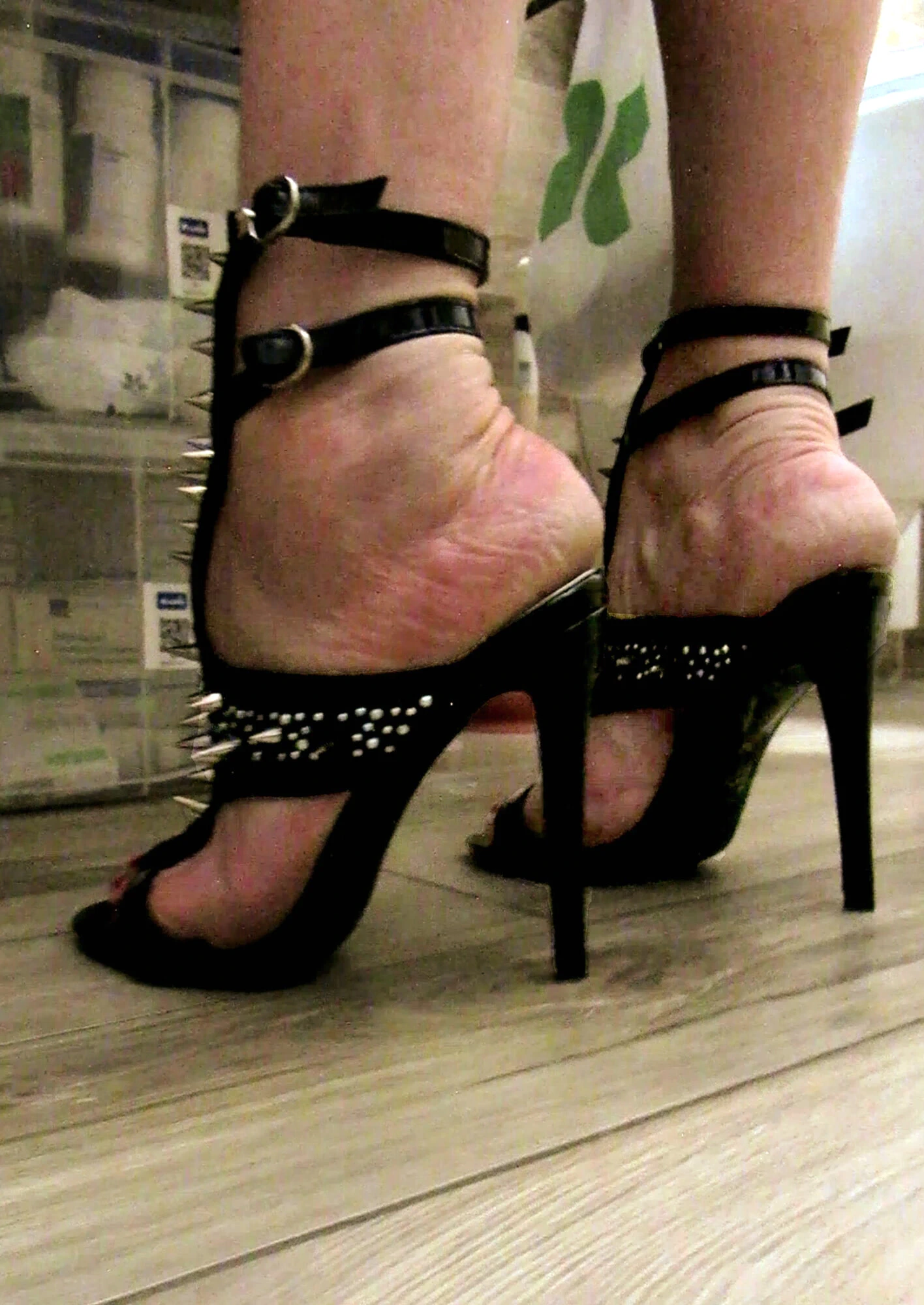 her fetish high heels with silver peaks