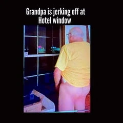 Дедушка у окна отеля