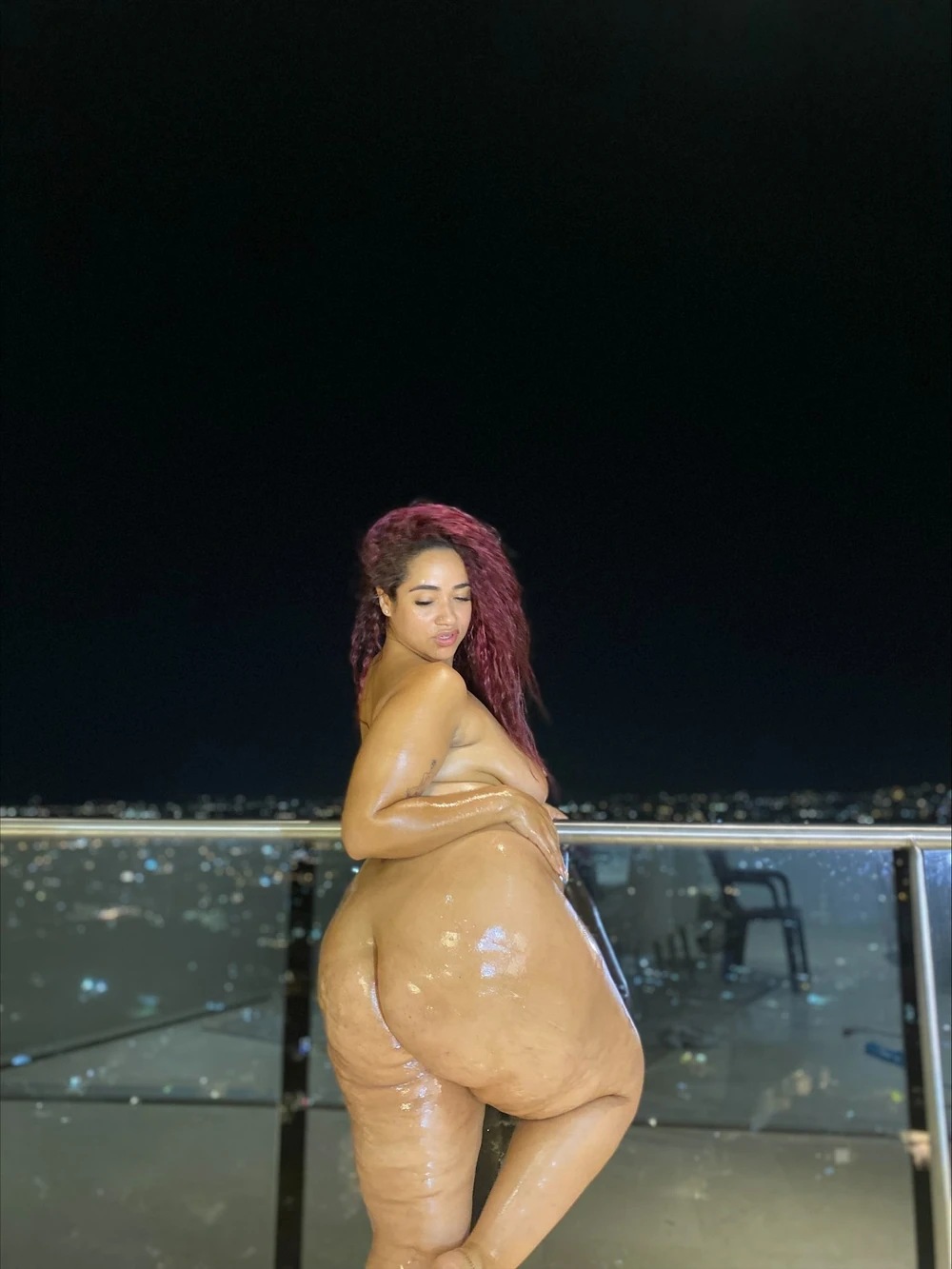 Naked on balcony with view of the city  #4