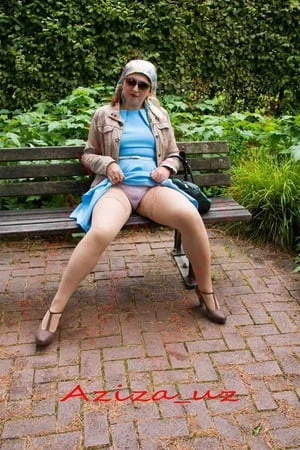 Muslim milf goes for a walk in the park and shows herself i