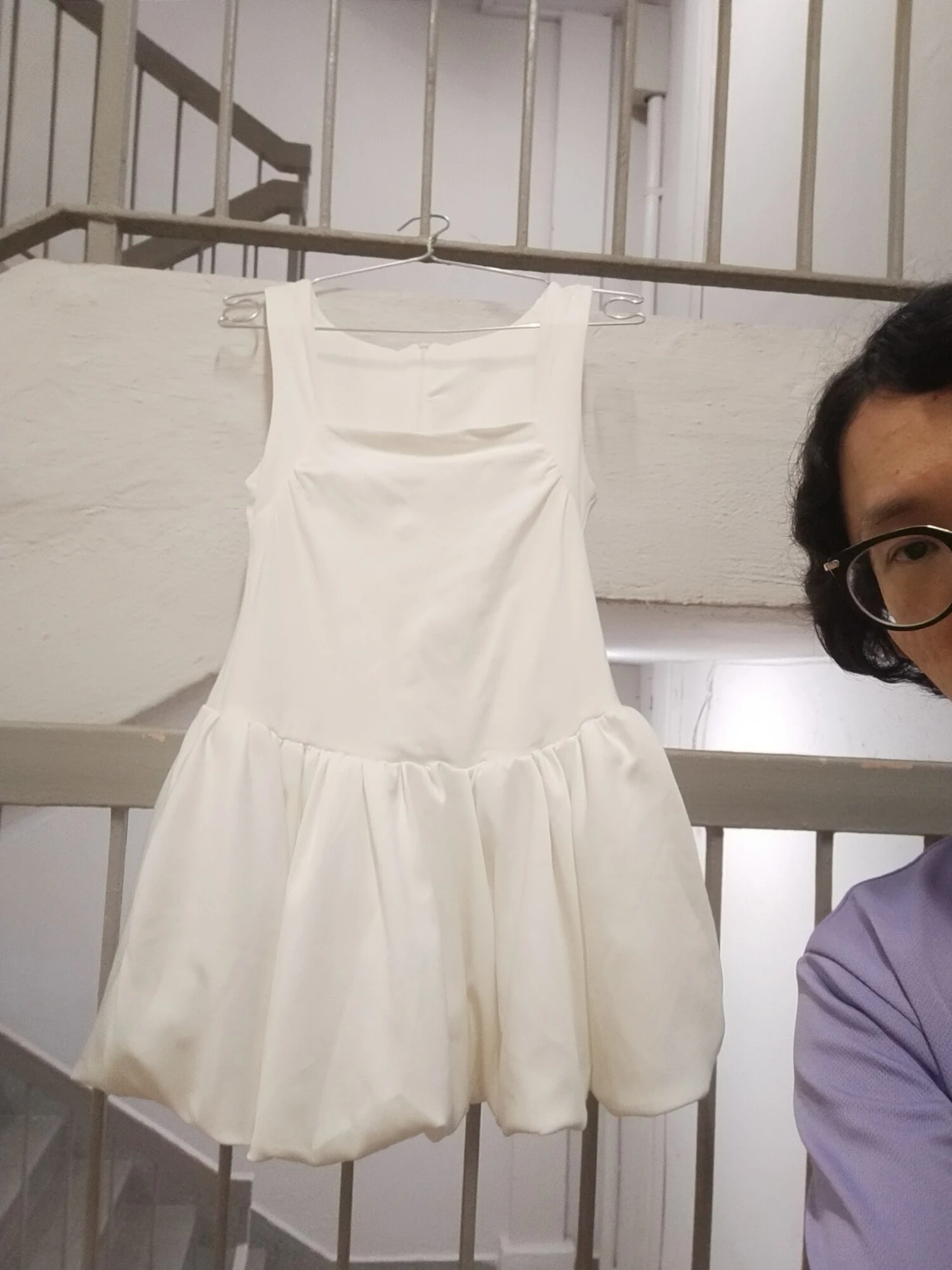 Secretly wearing random woman nightclub dress.