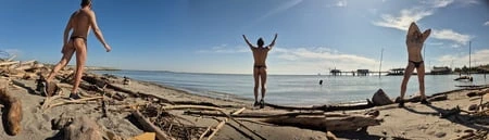 Boy in thong on the beach